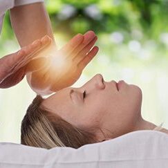 A person is being given reiki treatment